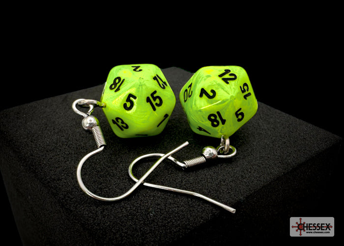 Green dice-shaped earrings on a black background with Chessex logo.