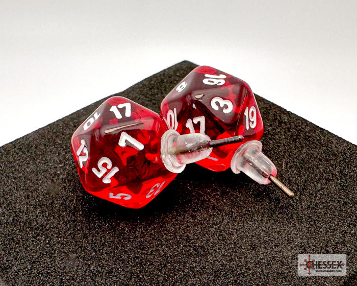 Two red dice with white numbers on a black surface, branded 'Essex'.
