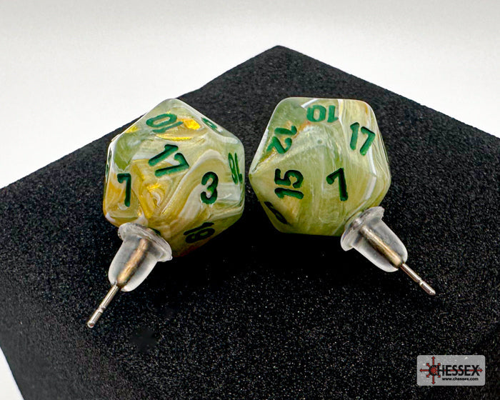Two green dice earrings on a black stand with 'Essex' branding.