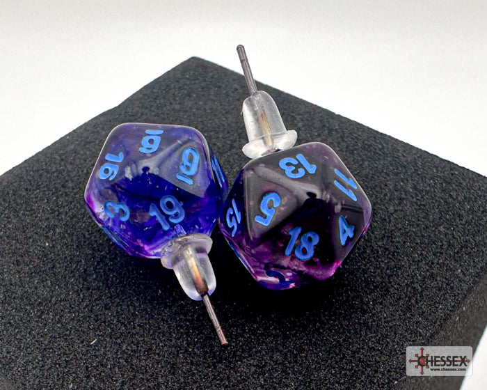 Purple dice-shaped earrings with blue numbers on a black stand.