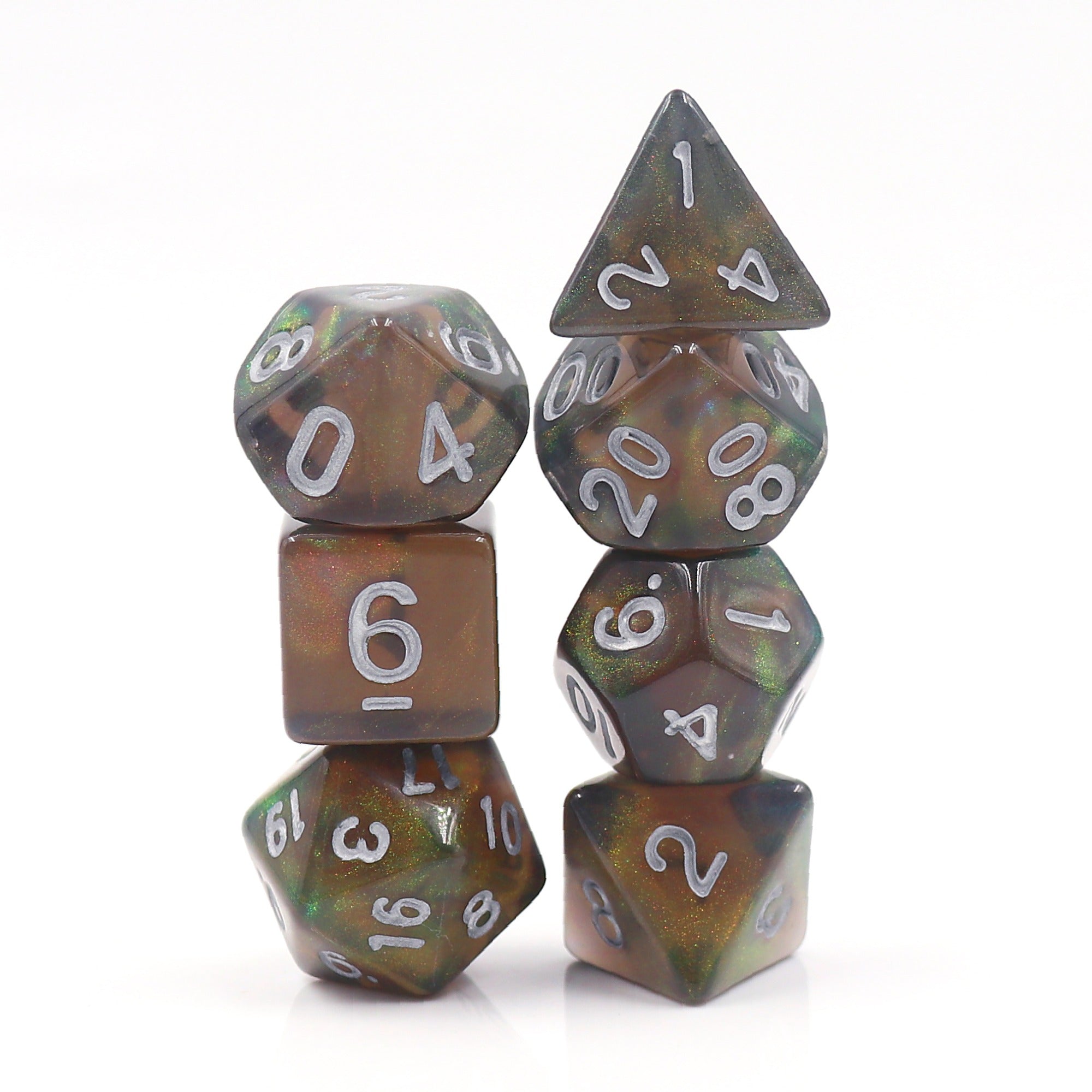 Set of polyhedral dice with metallic sheen on a white background