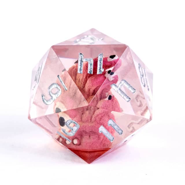 Translucent pink polyhedral dice with silver numbers on a white background