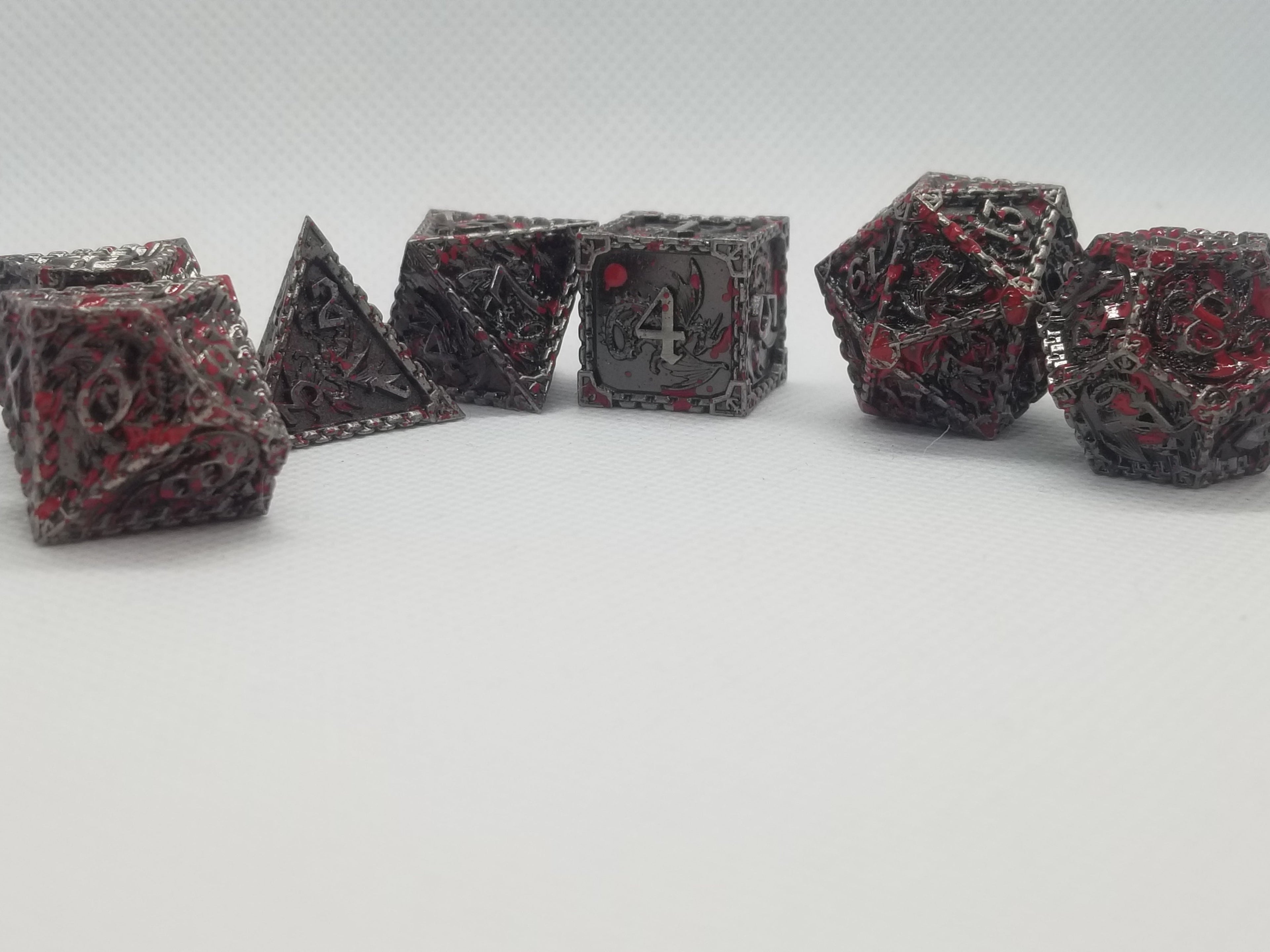 Set of dice with red and black patterns on a white background