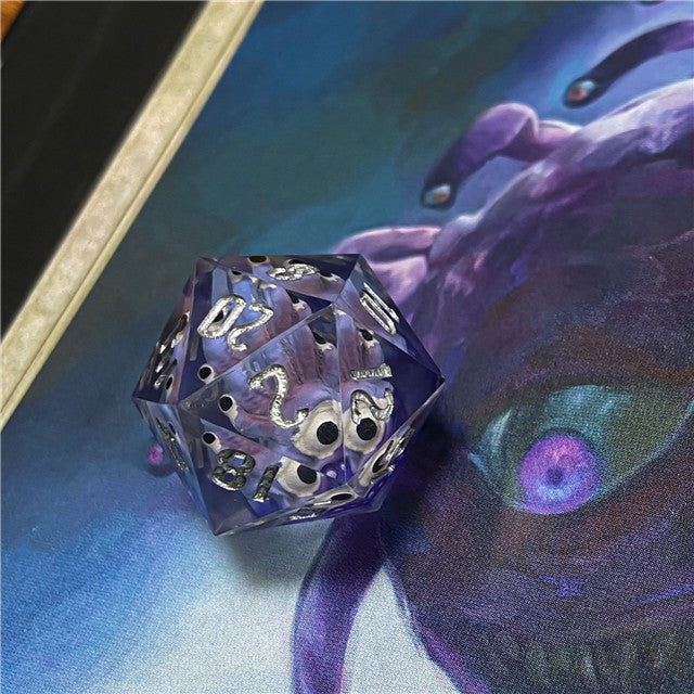 Transparent purple polyhedral dice with gold numbers on a fantasy-themed background