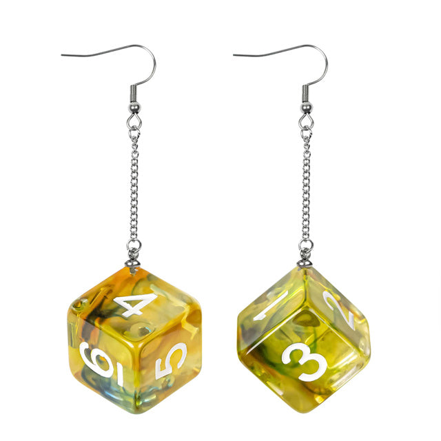 Pair of dice-shaped earrings with numbers on a white background