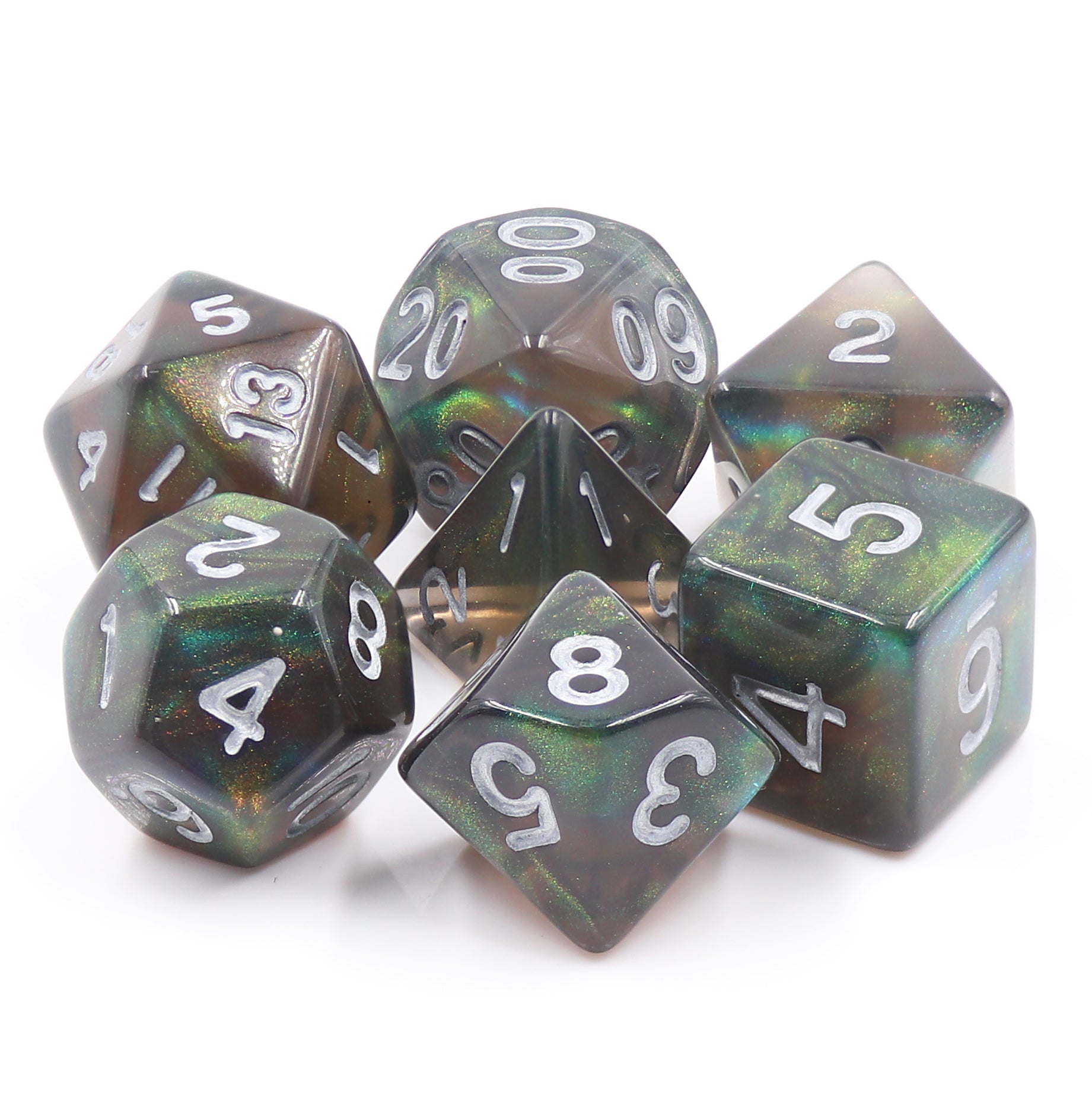 Set of polyhedral dice with green and black marbled pattern on a white background
