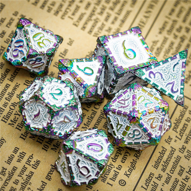 Set of metallic polyhedral dice on an old book page