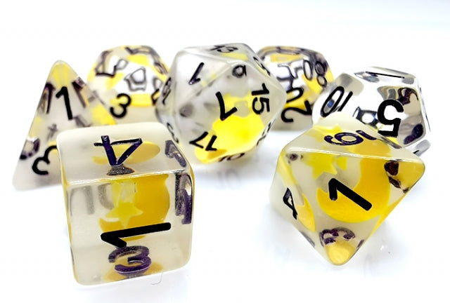 Set of dice with yellow and clear transparent body and black numbers on a white background