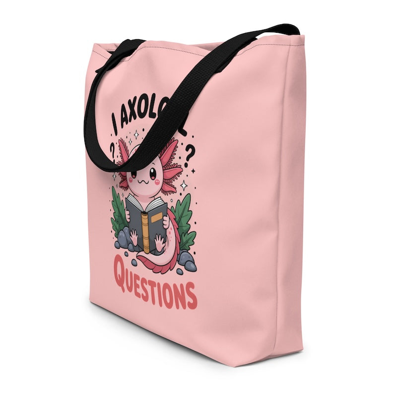 Pink tote bag with axolotl graphic and text on a white background