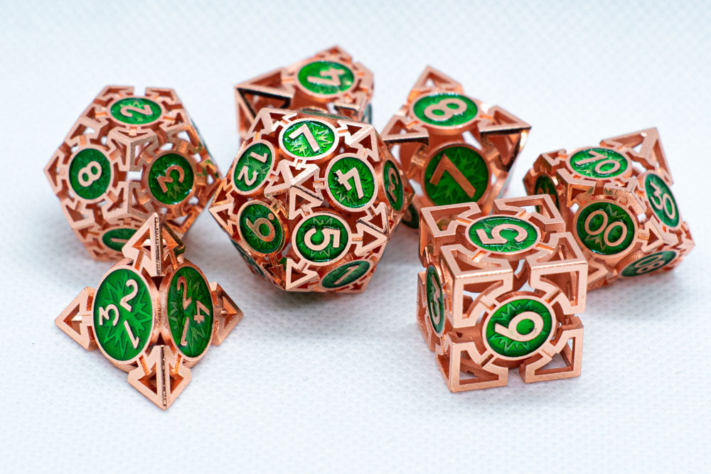 Set of copper and green polyhedral dice on a white background