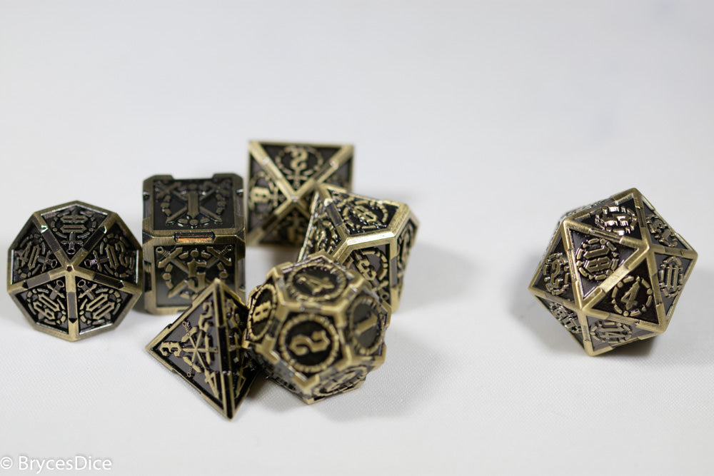 Set of ornate metal dice on a white background