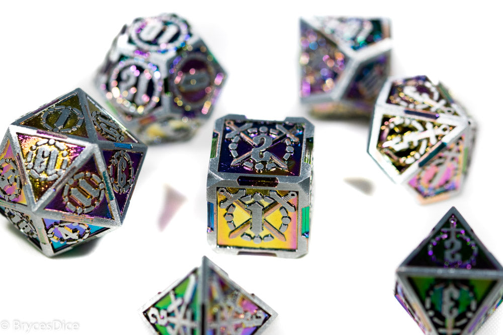 Metal dice set with colorful engravings on a white background
