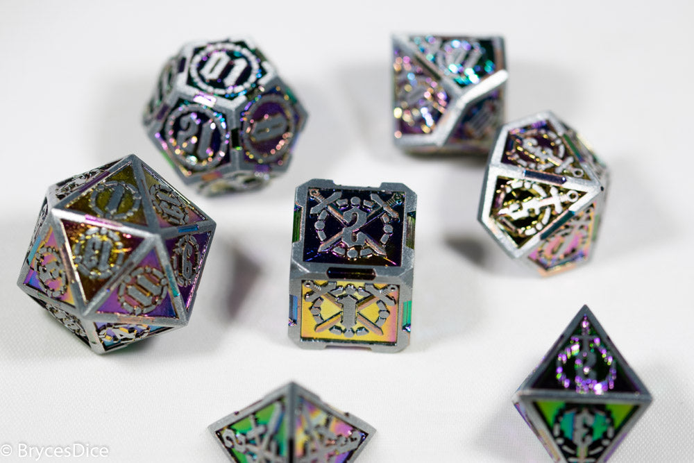 Set of metallic polyhedral dice on a white background