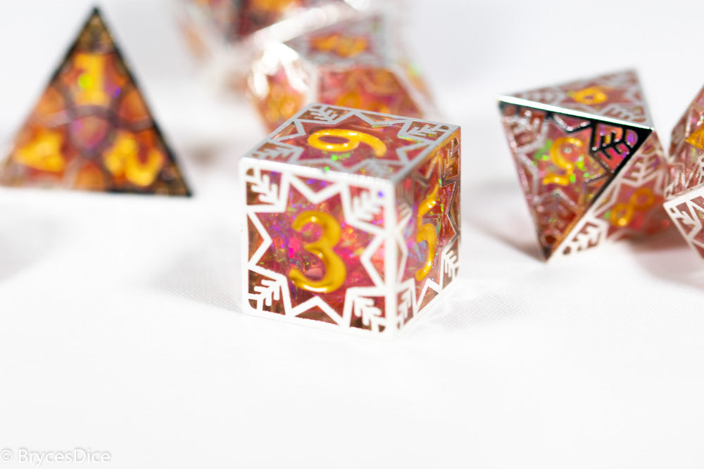 Colorful dice with geometric patterns and numbers on a white background