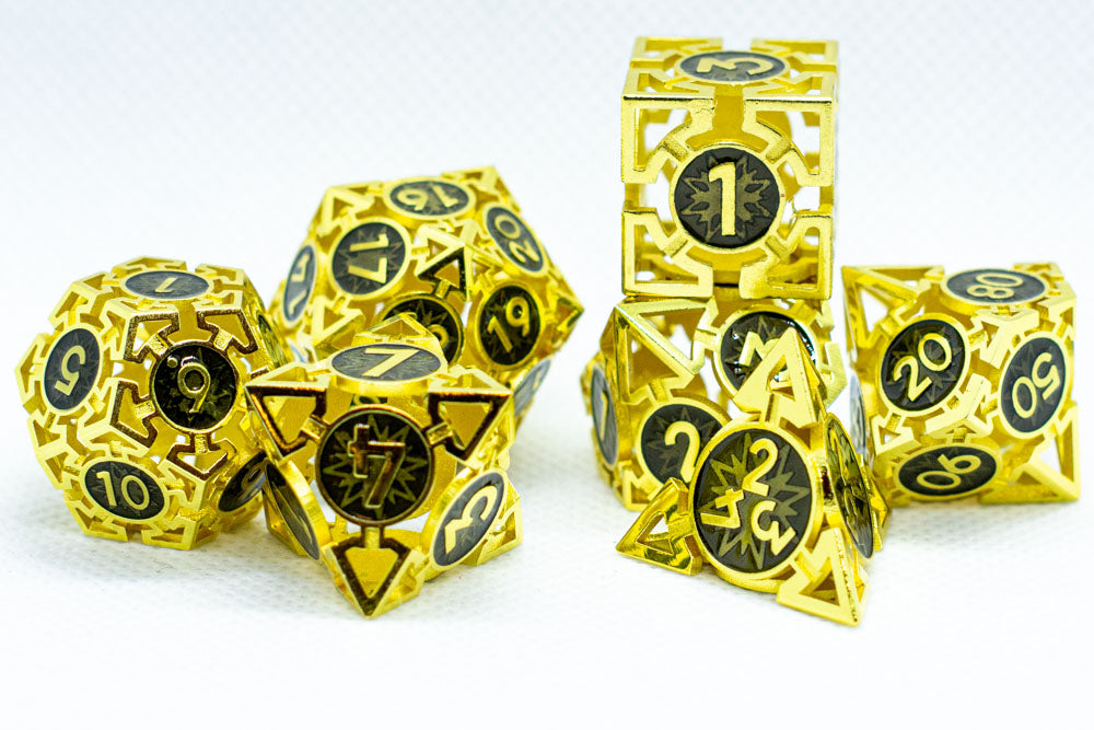 Gold and black polyhedral dice set on a white background
