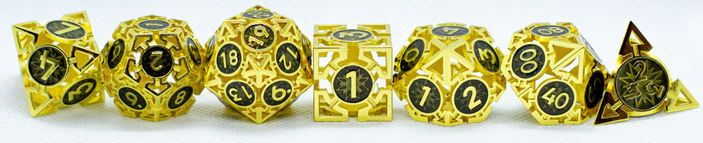 Set of gold and black polyhedral dice with clear faces