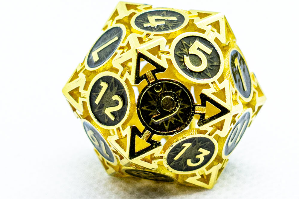 Gold and black polyhedral dice with numbers on a white background