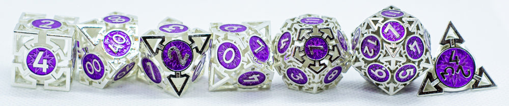 Set of polyhedral dice with purple and silver design on a white background