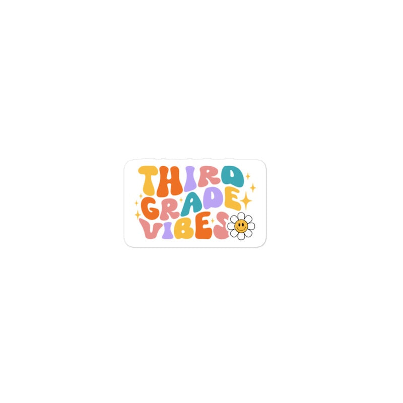 Colorful 'Third Grade Vibes' text with a flower on a white background