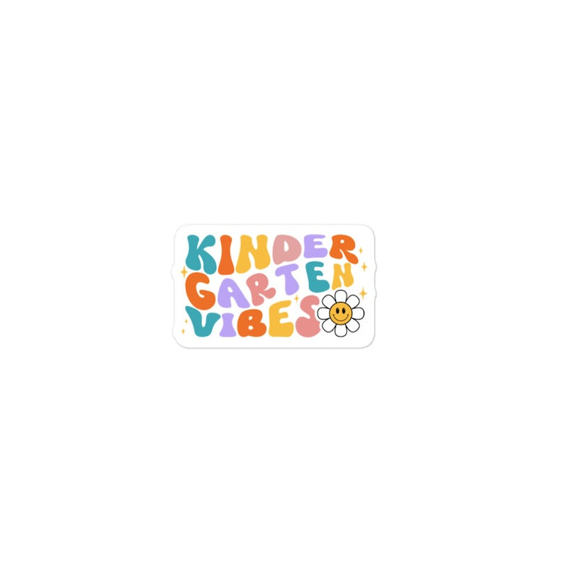 Colorful 'Kindergarten Vibes' text with a flower on a white background