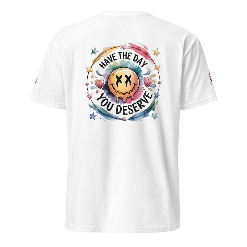 White t-shirt with colorful graphic and text 'Have the day you deserve' on a white background