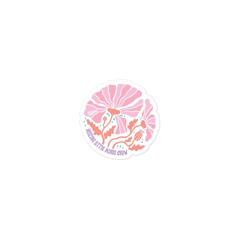 Circular sticker with floral design and text on a white background