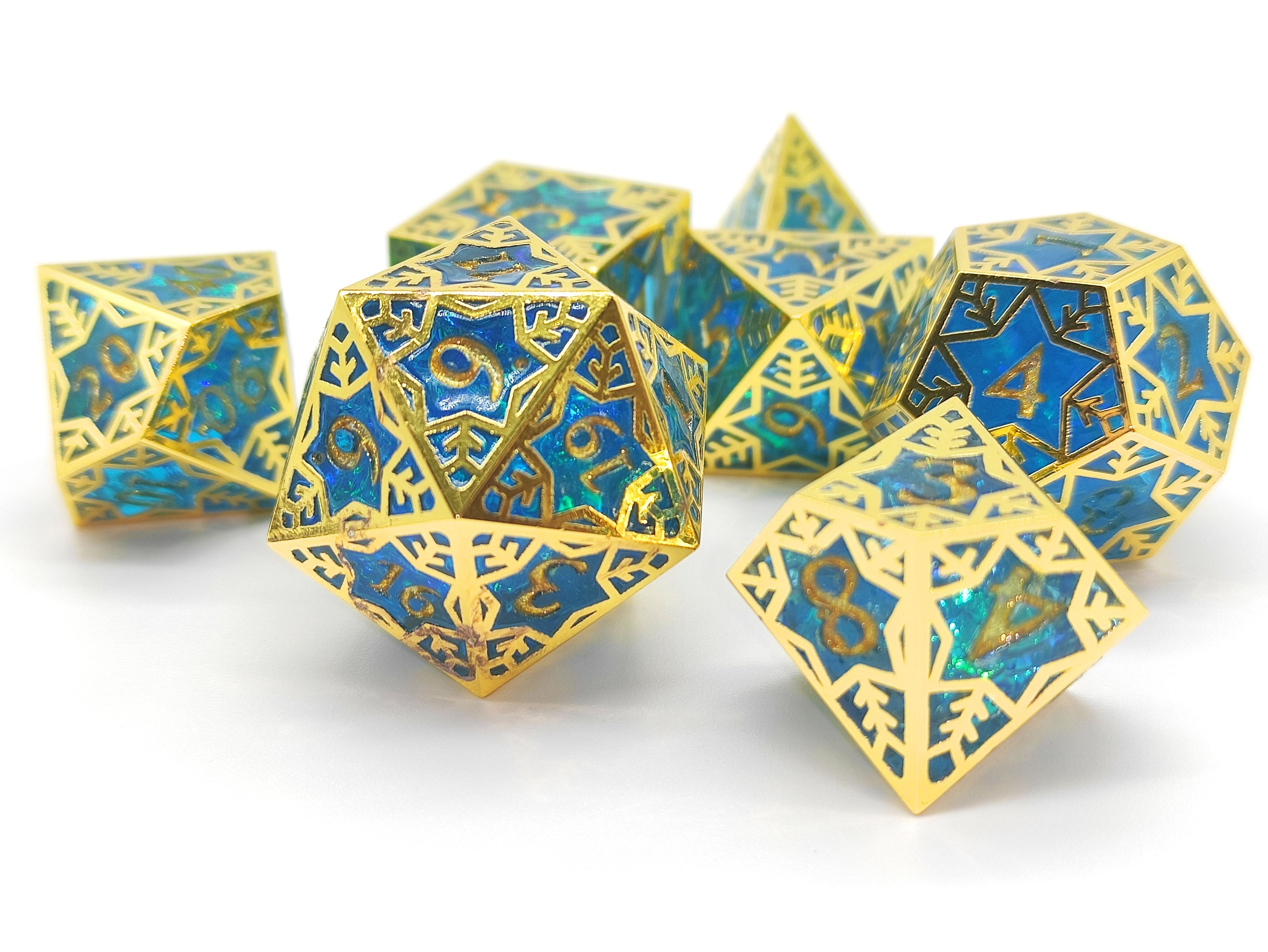 Set of blue and gold polyhedral dice on a white background