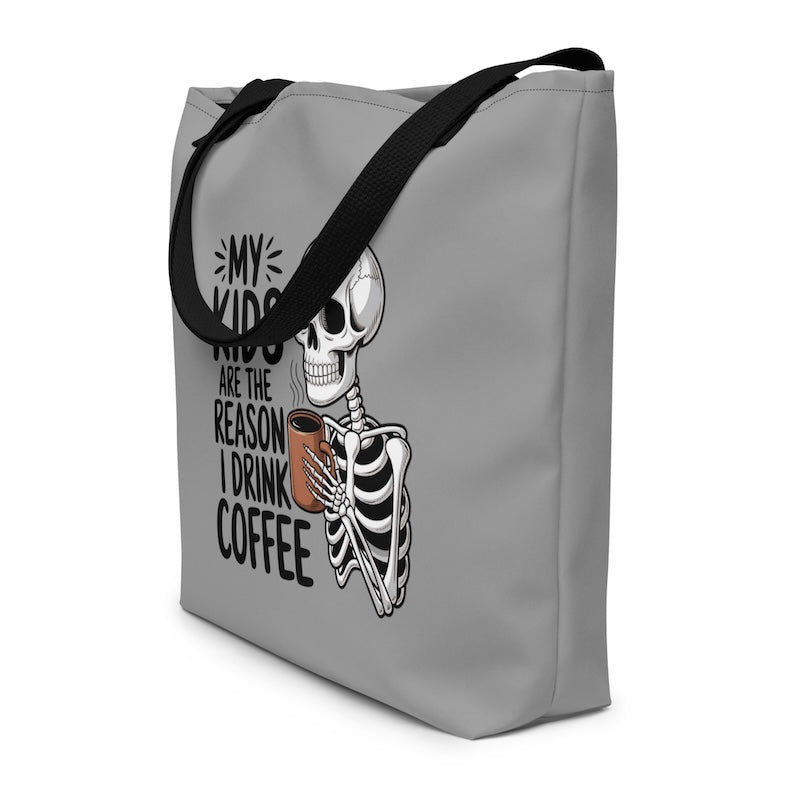 Gray tote bag with skeleton design and text on a white background
