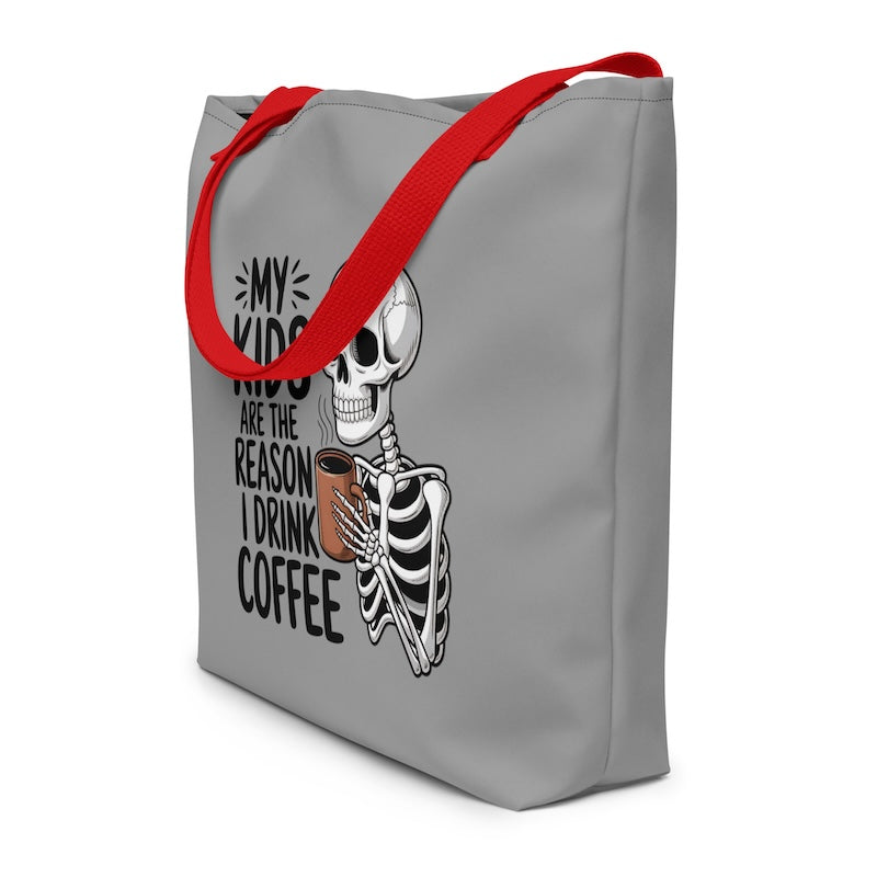 Gray tote bag with red handles featuring a skeleton and text on a white background