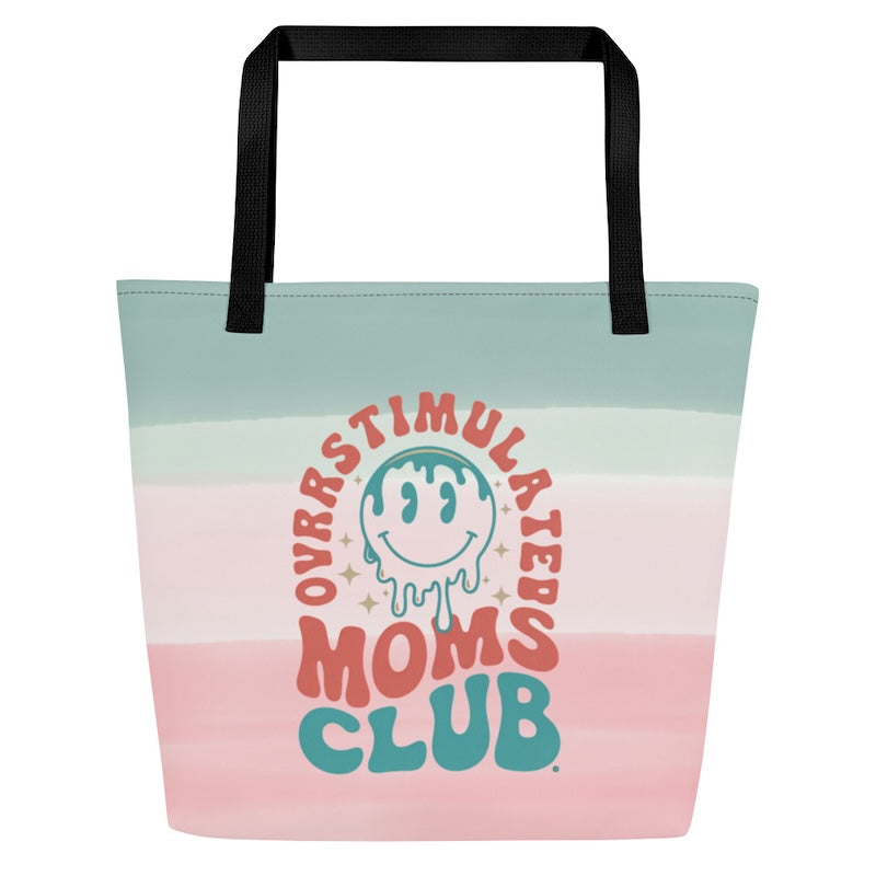 Tote bag with 'Ovrstimulated Moms Club' design on a gradient background