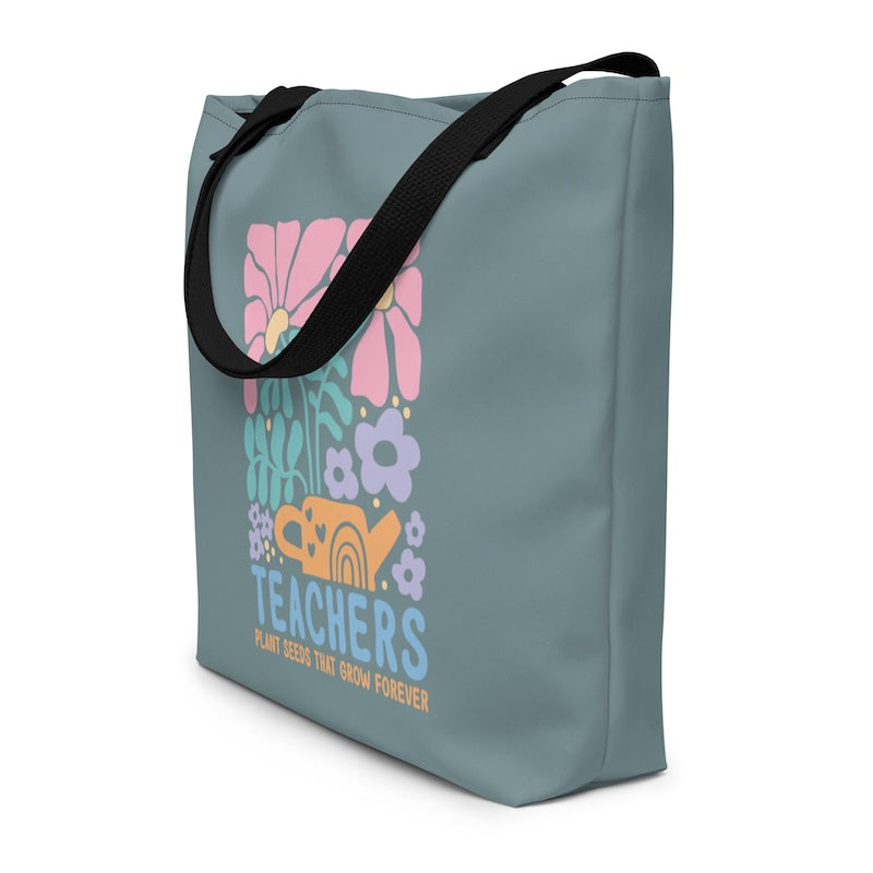 Gray tote bag with colorful floral design and 'Teachers' text on a white background