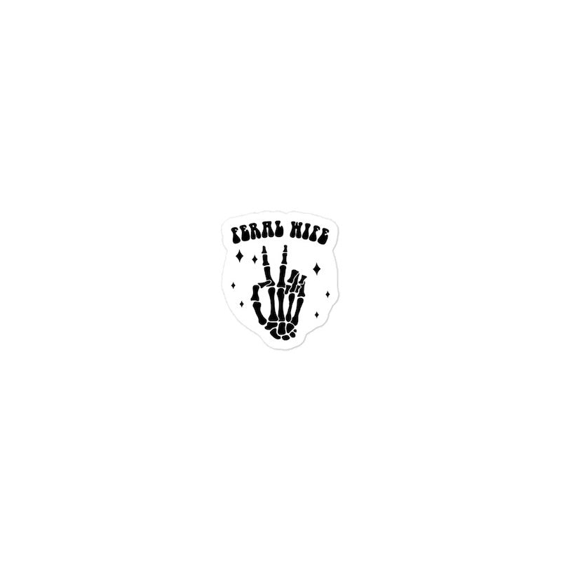 Black skeleton hand with 'FERAL WIFE' text on a white background