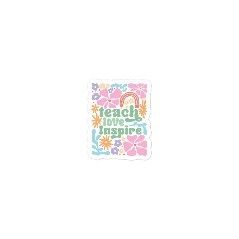 Sticker with 'teach love inspire' text and colorful design on a white background