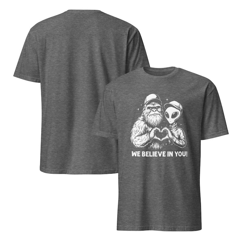 Gray t-shirt with a graphic of a Sasquatch and alien holding hands and 'We Believe In You!' text on a white background.