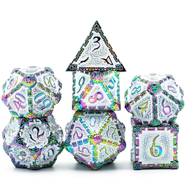 Set of colorful polyhedral dice with metallic sheen on a white background