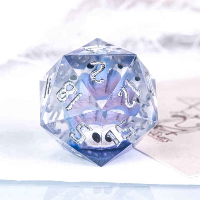Crystal polyhedral dice with numbers on a soft white background