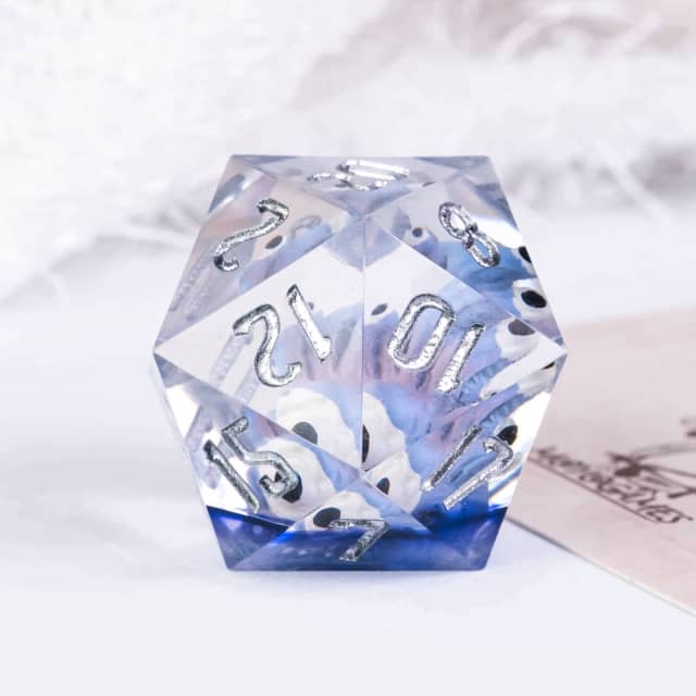Crystal polyhedral dice with numbers on a white background