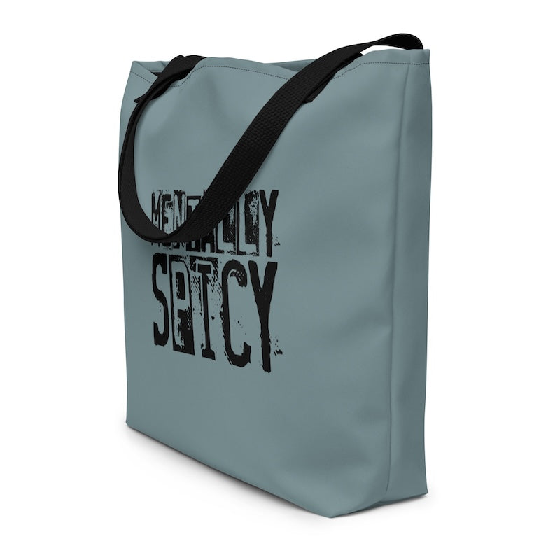 Gray tote bag with black text on a white background