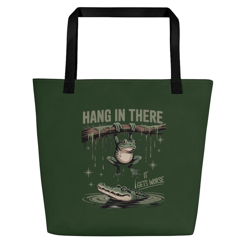 Green tote bag with a frog graphic and text on a white background