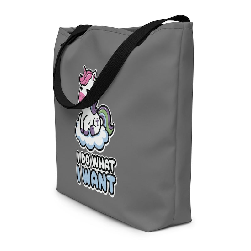Gray tote bag with a unicorn graphic and text on a white background