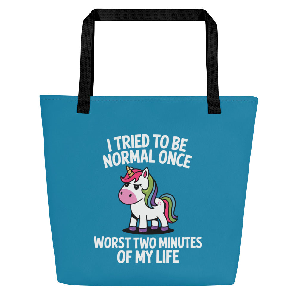 Blue tote bag with a unicorn graphic and humorous text on a white background