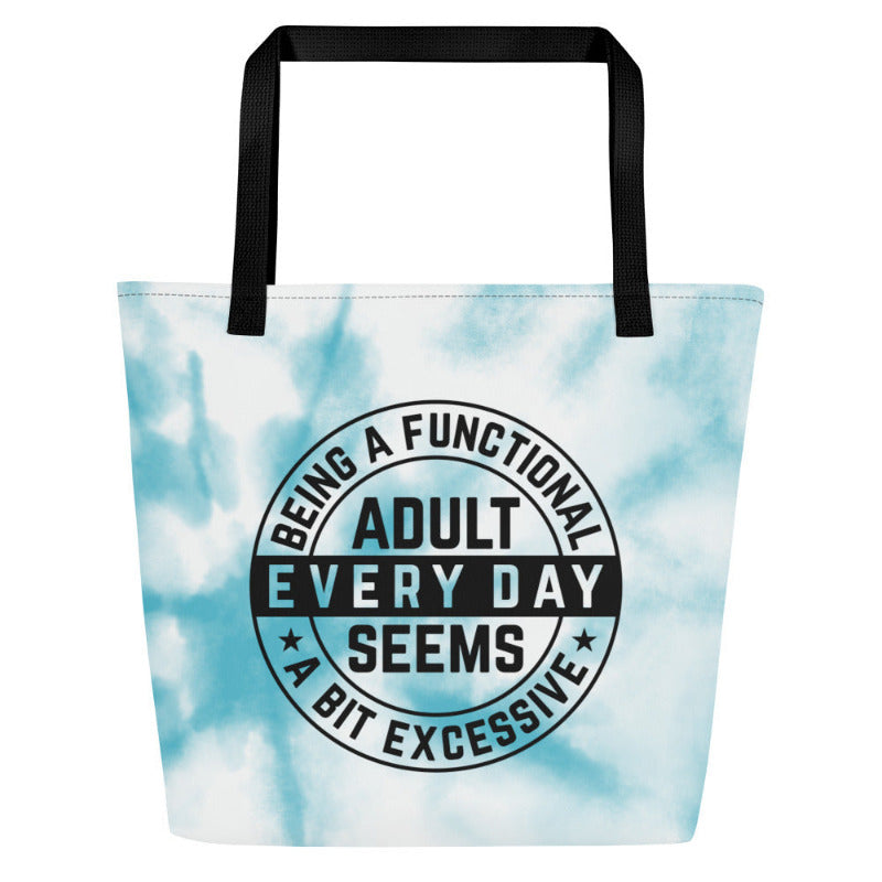 Tote bag with tie-dye design and humorous text on a white background