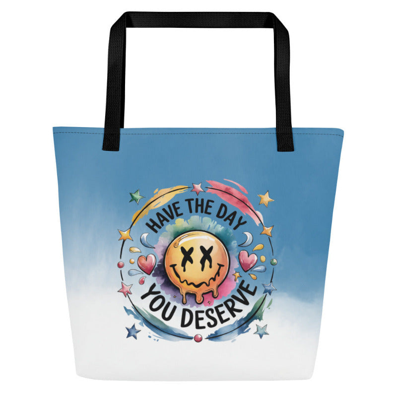 Tote bag with a smiley face and motivational quote on a white background