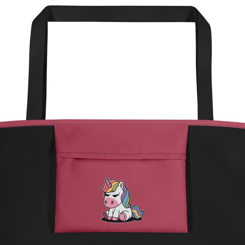 Black and pink tote bag with a unicorn design on a white background