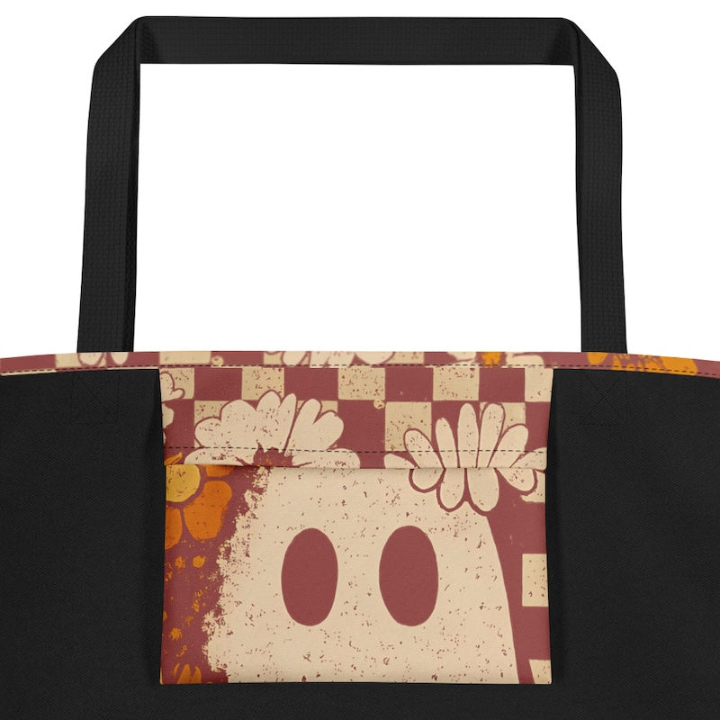 Tote bag with a vintage-style design featuring a face and checkered pattern on a white background.