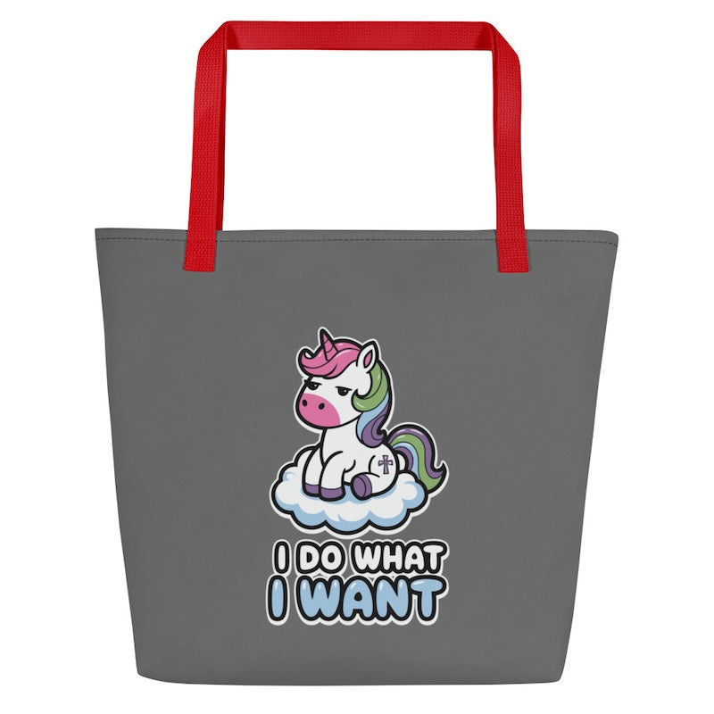 Gray tote bag with a unicorn graphic and 'I Do What I Want' text, red handles on a white background