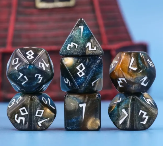 Set of polyhedral dice with star-like patterns on a blue background