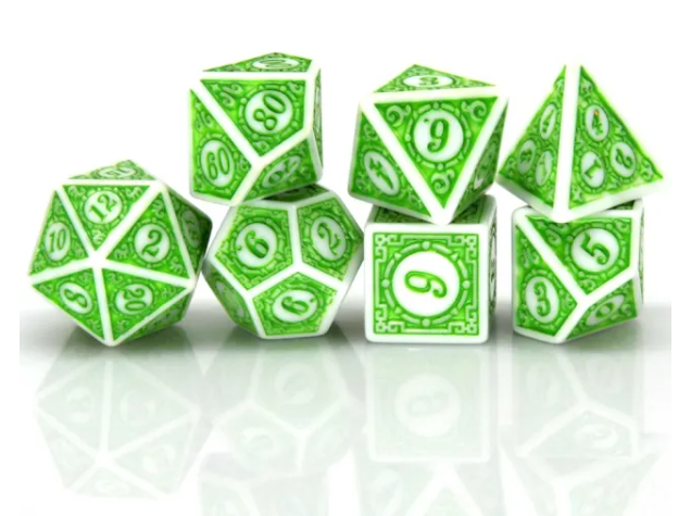 Set of green and white polyhedral dice on a white background