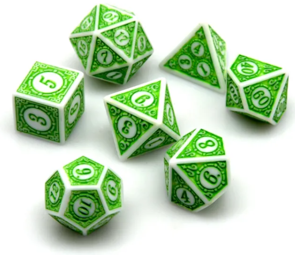 Set of green and white polyhedral dice on a white background