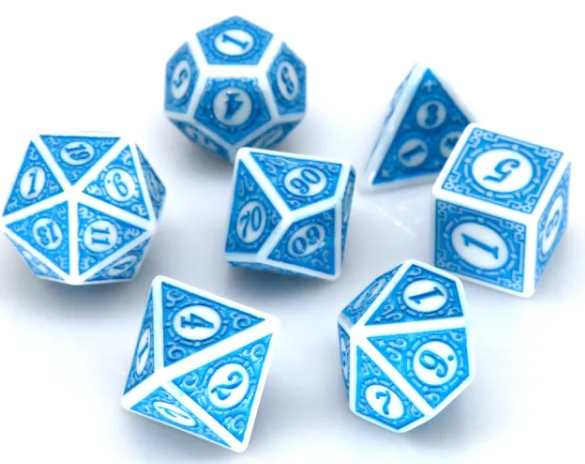 Set of blue and white polyhedral dice on a white background